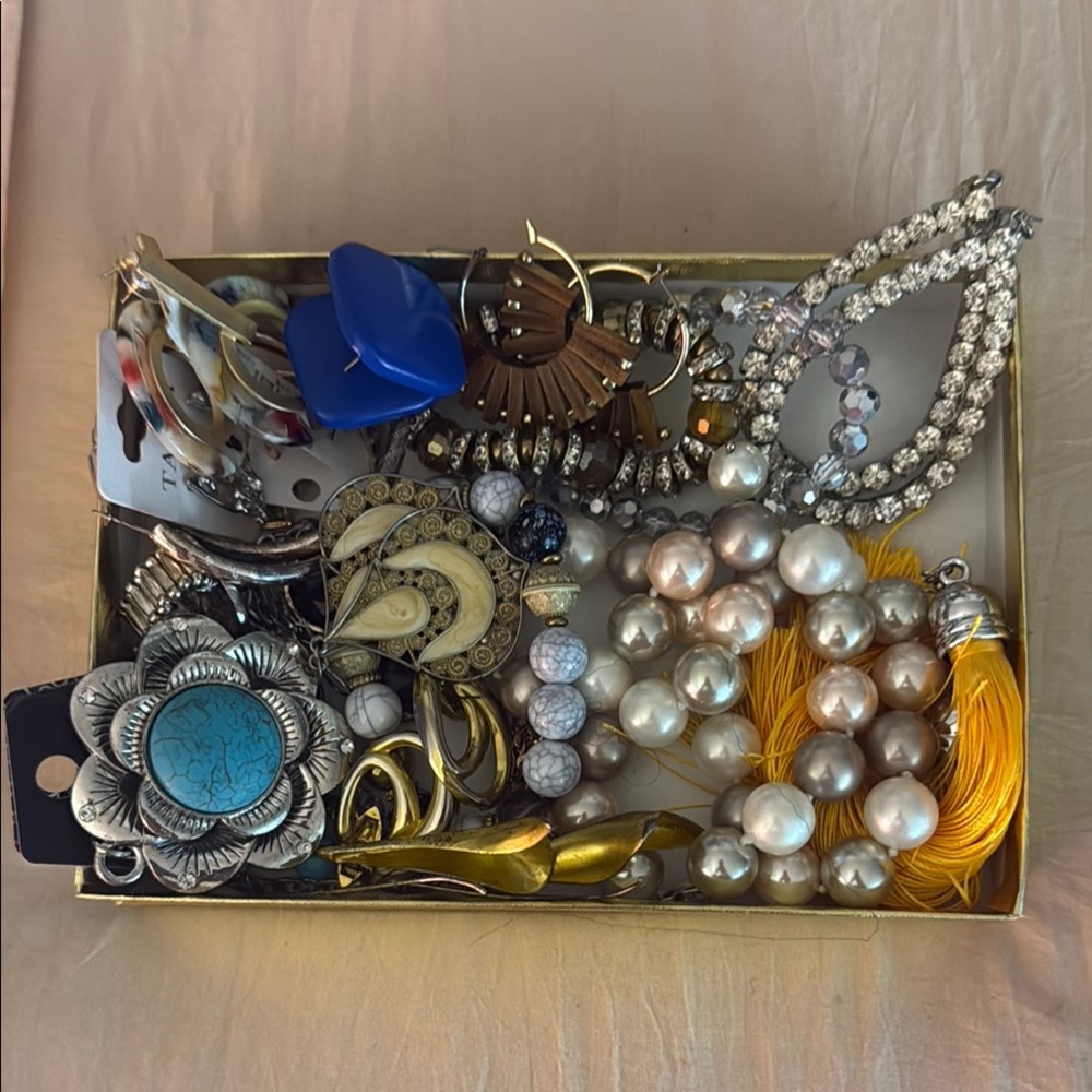 Elegant Jewelry Collection with Blue and Gold Accents